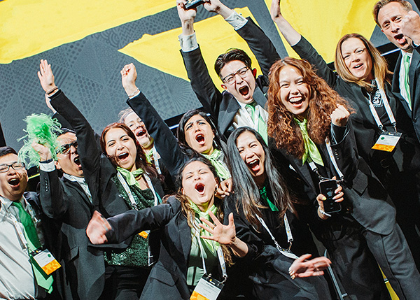group of students cheering